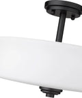 Side view of Three Light Matte Black Semi Flush Mount Ceiling Fixture With Tuscan Inspired Details UL Listed showing opal shade.