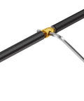 Close-up of a black cable with a gold connector from the Colorful Bike Brake And Shift Cable Connectors Kit, 20 Pcs, 4 Color Set