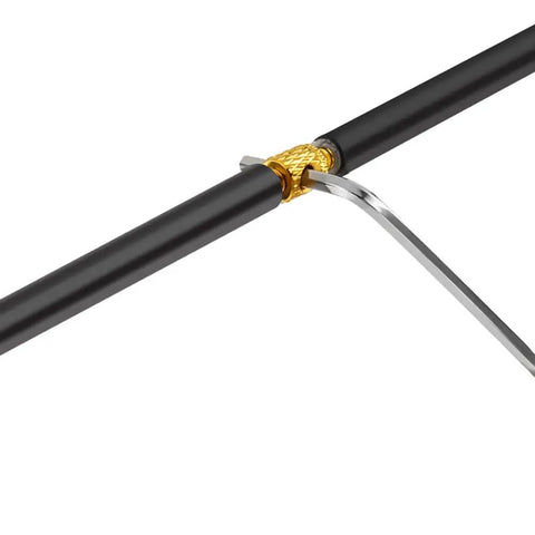 Close-up of a black cable with a gold connector from the Colorful Bike Brake And Shift Cable Connectors Kit, 20 Pcs, 4 Color Set