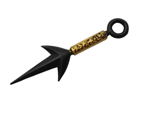 Black and gold kunai knife with ring handle and decorative engravings on the blade, angled view.