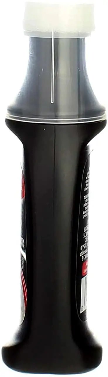 Side view of black bottle of Leather Dye Restorer in Black For Shoes Boots Furniture Jackets Briefcases And More With Sponge Applicator Water Resistant Finish Restores Color And Finish Before Polishing.