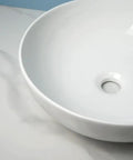 Close-up view of USZWBY Vessel Sinks Modern Simple Round Sink Home Bathroom Above Counter Basin showing smooth ceramic finish.