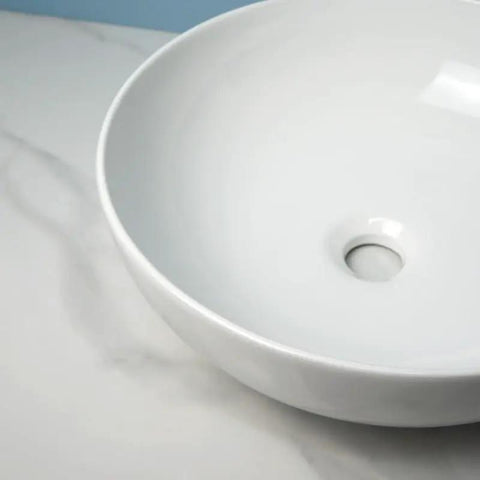 Close-up view of USZWBY Vessel Sinks Modern Simple Round Sink Home Bathroom Above Counter Basin showing smooth ceramic finish.