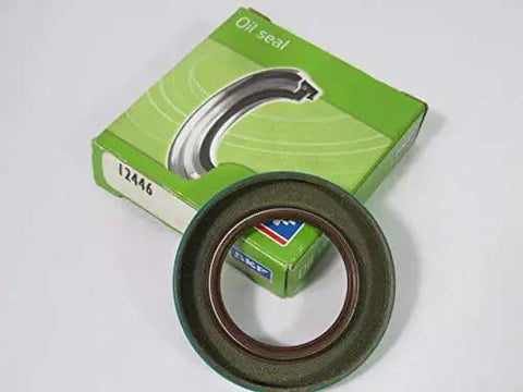 Grease Seals 12446 Stock Replacement Part For Bearings And Shafts Beefy Heavy Duty Rubber Seals box and seal displayed on a surface.