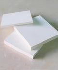 Stack of white Boron Nitride Ceramic Sheet Pad And Plate For Heat Proof Performance, Nonstick Surfaces, Low Friction, 150 x 150 x 2 mm