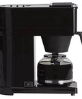 Side view of Velocity Brew 10 Cup Home Coffee Brewer with a stainless steel hot water tank and easy flip lid in black finish.