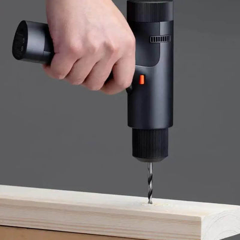 Slick Brushless Cordless Drill And Screwdriver Set With Lightning Fast Type C Charging For Weekend Warriors handling wood drilling.
