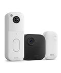 Wireless Smart Security Camera Kit With Video Doorbell And Outdoor Cams Delivering Head To Toe HD View Two Year Battery Life Sync Module Included Smooth Setup, includes three cameras in white and black.