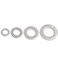 Different sized washers from All In One Stainless Steel Washer And Fastener Assortment Kit 684 Piece Box With M2 To M12 Sizes.
