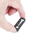 Universal Vehicle Door Buffers Knock Back The Heavy Slam With Chunky Silicone Shock Absorbers and Grip Tight Latch Protectors For Pickup Trucks Jeeps and Road Cruisers, black silicone buffer pad held in hand.