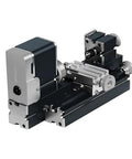 Miniature all-metal lathe for hobbyist use, black base with silver carriage and adjustment knobs