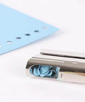Tough As Nails Single Hole Punch For Crafts And Scrapbooks, Quarter Inch Hole Puncher In Zinc Alloy, with blue punched paper