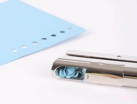 Tough As Nails Single Hole Punch For Crafts And Scrapbooks, Quarter Inch Hole Puncher In Zinc Alloy, with blue punched paper