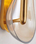 Close-up of Premium Handcrafted Glass Wall Sconces For Bedroom And Living Room Solid Stainless Steel Bedside Lighting Fixture with a sleek gold finish.