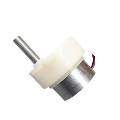 Side view of a DC gear motor with white plastic gear housing, metal can body, protruding shaft and red/black wires.