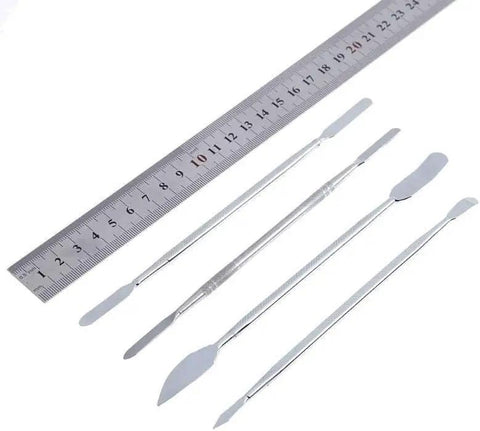 No Sweat 37 Piece Watch Repair Kit And Smartphone Teardown Set With Precision Drivers showing silver tools and a measuring ruler.