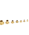 Various sizes of brass eyelets from the 650-Piece Brass Eyelets And Rivets Buttonhole Kit For Shoes, Hats, Shirts, Belts, Backpacks, And Jackets