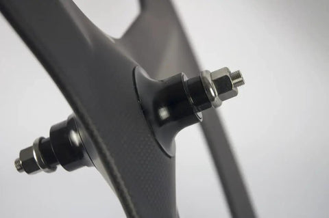 Close-up of Tri Spoke 88mm Carbon Wheelset For 700c Clincher Fixed Gear Track Bikes, hub detail, lightweight carbon material