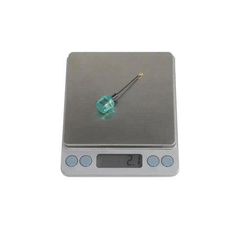 Two Pack 5.8GHz 40mm Ipex UFL LHCP Antenna Replacement on digital scale showing 2.1 grams