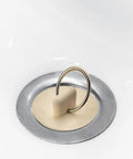 Peirushg Bathtub Easy-Install Stopper Quick 1-3/8in. white rubber stopper in a chrome drain with split-type ring.