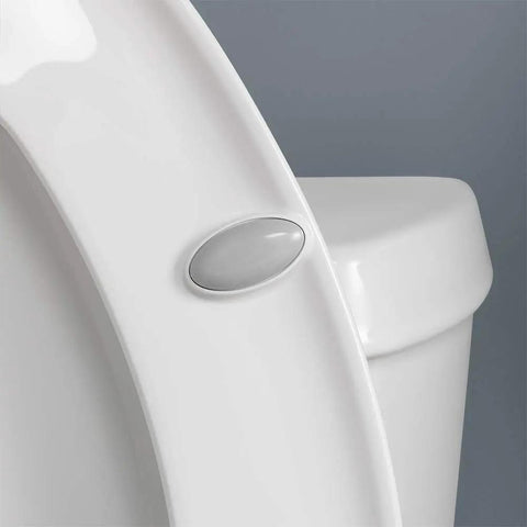 Close-up of white elongated toilet seat with insert for comfort, featuring quiet close mechanism, highlighting contoured ring