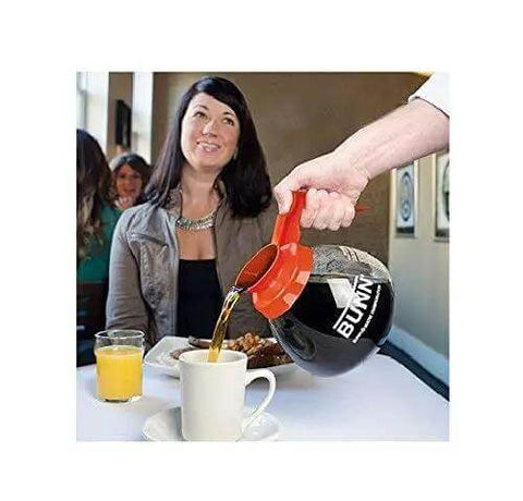 Coffee Pot Decanter Carafe Set With 12 Cup Capacity, Three Pieces Including Two Black Regular And One Orange Decaf in use