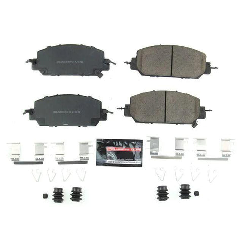 Front view: PowerStop Z23-2036 carbon-fiber ceramic front brake pads kit with install hardware (four pads).