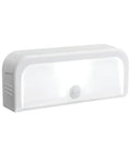 Wireless Motion Sensing LED Night Lights Six Pack Tiny Stick Anywhere White Battery Powered Auto On When Motion Is Detected In Darkness Great For Hallways Closets And Stairs, close-up of single white light unit.
