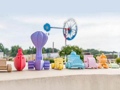 Collection of 3D printed toys using Panchroma Matte Pastel Periwinkle PLA Filament For 3D Printing, showcasing vibrant colors.