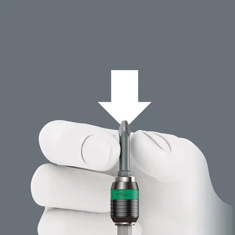 White gloved hand holding a tap bit from the 7 Piece Tap Bits Set With Rapidaptor Quick Change Technology near a white arrow.