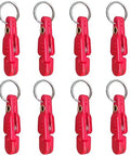 Eight red release clips with metal key rings for planer board fishing, front view