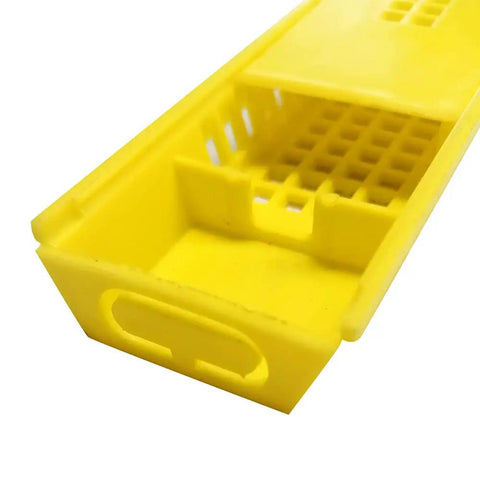 Close-up of yellow Plastic Queen Bee Cages 12 Pack Beekeeping Go To Transporting Catcher Kit with ventilation openings
