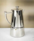 Stainless Steel Stovetop Espresso Maker For 6 Cups Easy To Clean Moka Pot with heat-resistant design on a countertop