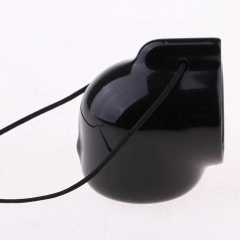 Side view of a black PVC valve cover cap with retainer cord from the Scuba Tank Valve Cover Caps Kit For York A-Clamp Cylinders 8 Pack.