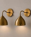 Mid Century Modern Brass Wall Sconces Set of 2, sleek brass wall light fixtures in unique shade design for bedroom or hallway.