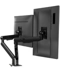 Robust Height Adjustable Monitor Riser With Smooth Full Motion Articulating Arm For Ergonomic Desk Mount and Cable Free Workspace Upgrade showing back view with dual monitors and adjustable arm.