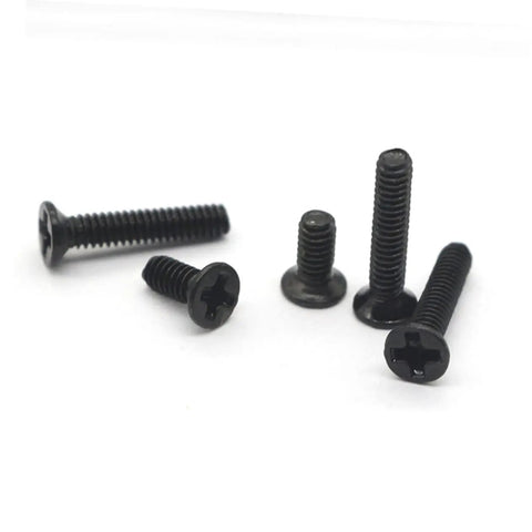 Close-up of black carbon steel screws from Miniature Countersunk Screw Set With Transparent Storage Case.