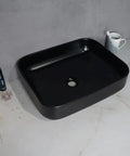 USZWBY Vessel Sinks Modern Simple Household Black Wash Basin Ceramic Above Counter Hotel Bathroom Countertop Sink from the top view.