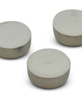 Three round metallic discs with engraved text for Green Laser Guide For Miter And Portable Saws 10x Brighter Laser For Outdoor Use.