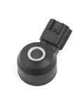 Beefy Ignition Knock Sensor For Nissan Frontier Xterra Replacement 22060 7B000 22060 2A000 Solid Metal And Plastic Sensor That Sniffs Out Engine Knocks Built Tough To Handle Heat Vibration And Corrosion. Black round metal-plastic knock sensor with connector