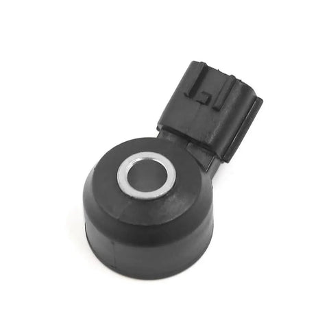 Beefy Ignition Knock Sensor For Nissan Frontier Xterra Replacement 22060 7B000 22060 2A000 Solid Metal And Plastic Sensor That Sniffs Out Engine Knocks Built Tough To Handle Heat Vibration And Corrosion. Black round metal-plastic knock sensor with connector