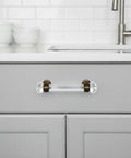 Kitchen cabinet with 10 Pack No-Brainer Oil Rubbed Bronze Glass Cabinet Handle Pulls, 3 Inch Hole Centers, installed on gray drawer.
