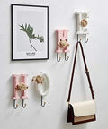 Pack Of Two Dope Rustic Metal And Wood Wall Hooks Featuring Home Love Script Built Tough For Daily Use Perfect For Hanging Hats Towels And Coats Adding Fresh Vibe To Your Entryway, displayed with decor.
