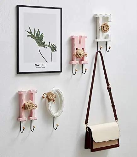 Pack Of Two Dope Rustic Metal And Wood Wall Hooks Featuring Home Love Script Built Tough For Daily Use Perfect For Hanging Hats Towels And Coats Adding Fresh Vibe To Your Entryway, displayed with decor.