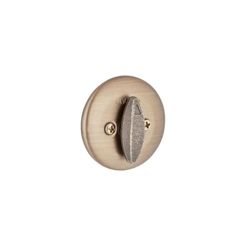 Interior view of Pick Resistant SmartKey Rekey Deadbolt For Exterior Doors in Antique Brass, featuring turn piece and round exterior
