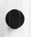 High Strength Suction Cup Armrest for Cabinets, Wardrobes and Refrigerators with ABS construction, installed on a white door.