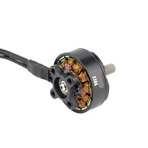 Close-up of 2306 1700KV 2400KV Brushless Motor for FPV RC Drones, showing copper coils and mounting screws.