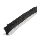 Close-up of Commercial Storefront Door Pile Weatherstrip.25 Inch By 100 Feet for gap sealing, featuring black polypropylene fibers.