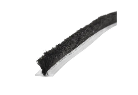 Close-up of Commercial Storefront Door Pile Weatherstrip.25 Inch By 100 Feet for gap sealing, featuring black polypropylene fibers.