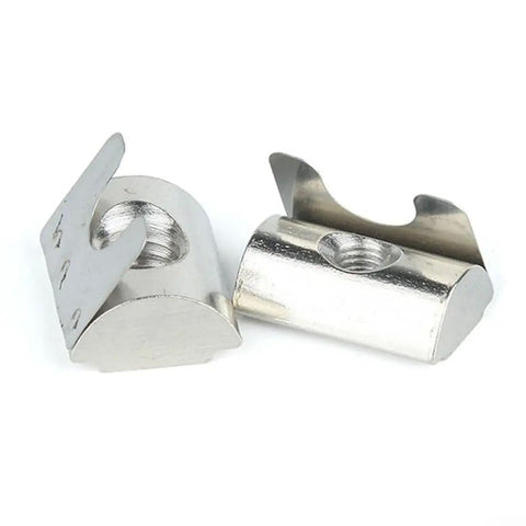 Solar Panel Grounding Nuts Drop-In Style For T Slot Aluminum Extrusion Profiles With 8Mm Groove Heavy Duty Carbon Steel Fasteners Perfect Fit For 30 Series And 40 Series PV System Installation Kits Including 20 Pieces Made To Hold Up Strong, close-up view of stainless steel drop-in grounding nuts.